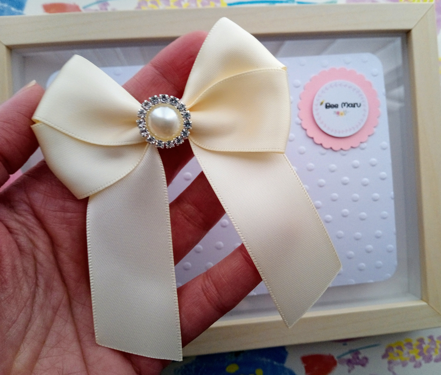 Ivory Satin Ribbon Bow with Faux Pearl Charm Centre - Classic Hair Accessory for Special Occasions