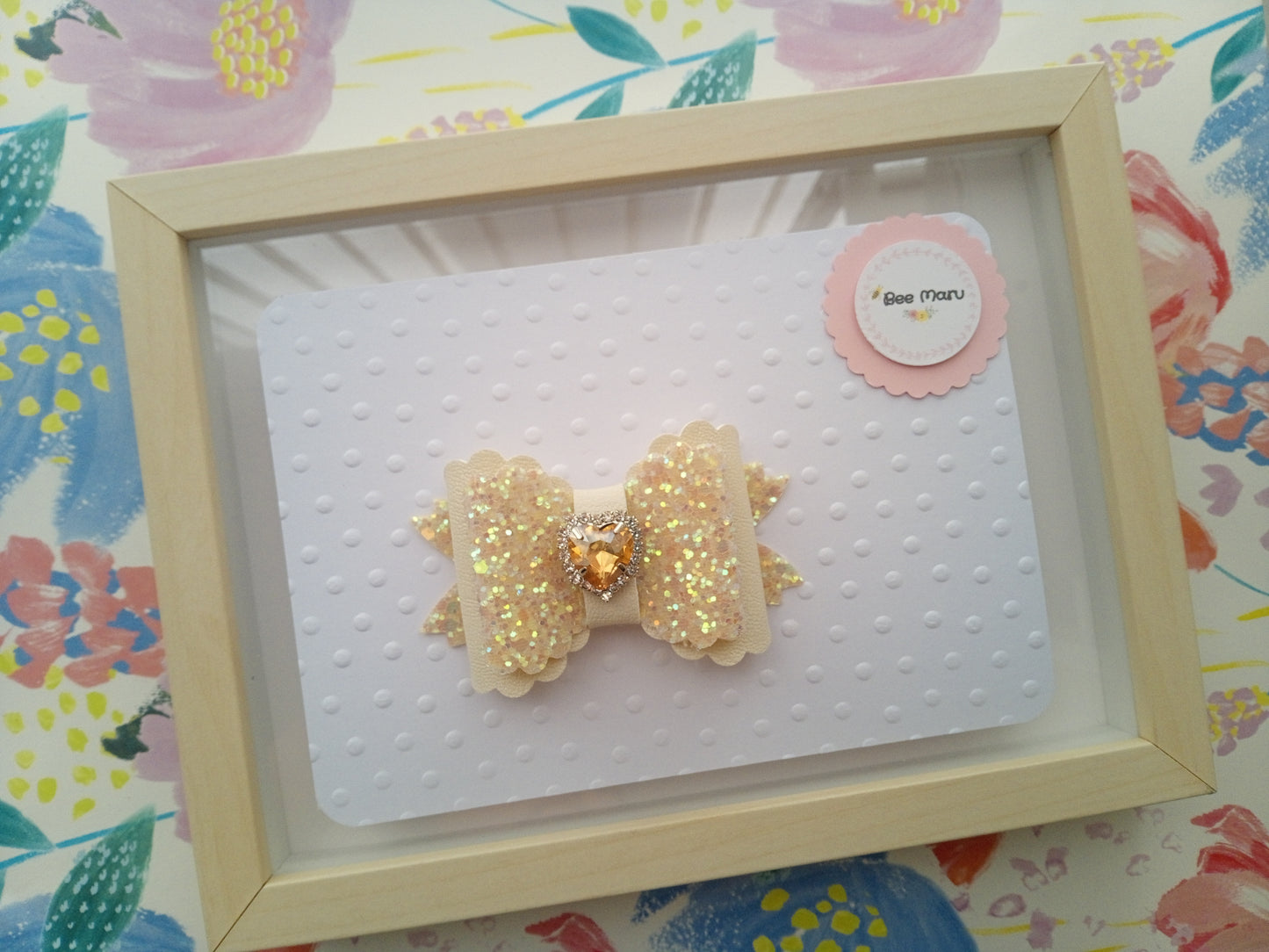 Sparkly hair bow clip with shiny heart shape diamante